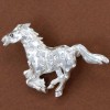 broche cheval au galop stylisée