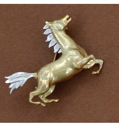 cheval stylisé en argent broche