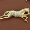 broche cheval qui saute