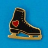 ice skating black shoe and heart pin