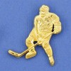 pin's grand joueur de hockey doré